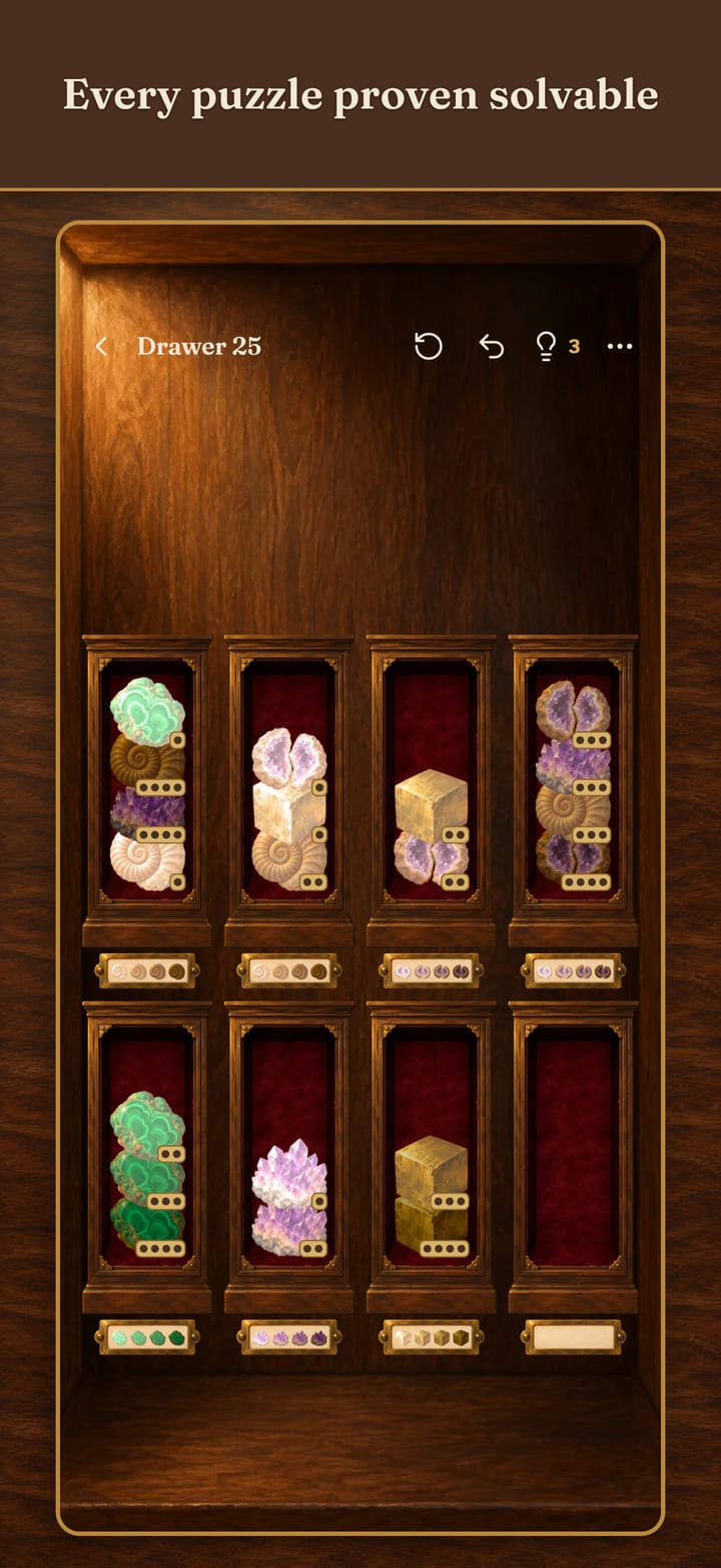 Every puzzle proven solvable. A level of Minerals: malachite, ammonite, amethyst, geode and pyrite pieces in eight red velvet drawers, each piece marked with small dots for its shade